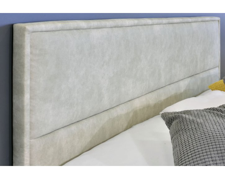 Zvýšená čalúnená posteľ s úložným priestorom Marila